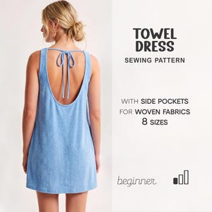 May include: A light blue towel dress with a scoop back and tie closure. The text reads: TOWEL DRESS SEWING PATTERN WITH SIDE POCKETS FOR WOVEN FABRICS 8 SIZES beginner. The design features a sleeveless cut and a short hemline for a simple garment.
