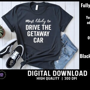 May include: A black t-shirt with white text that reads "Most likely to DRIVE THE GETAWAY CAR". The shirt is laid out on a wooden surface with a pair of black and white sneakers and a pair of blue jeans.