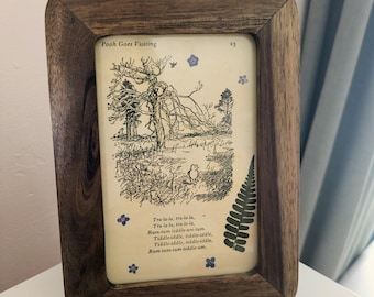 Page de livre de Winnie l'ourson pour l'art floral pressé de chambre de bébé, cadre en bois