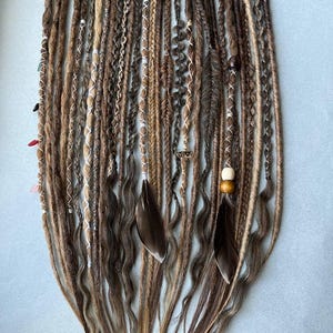 This set is Mix different styles THIN braids and dreads beige,brown,black,blond.This set can be Double ended dreads(DE)or Single ended dreads(SE)variation.This kit of dreads made by Synthetic hair - Kanekalon. The material is light & absolutely safe