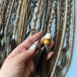 This set is Mix different styles THIN braids and dreads beige,brown,black,blond.This set can be Double ended dreads(DE)or Single ended dreads(SE)variation.This kit of dreads made by Synthetic hair - Kanekalon. The material is light & absolutely safe