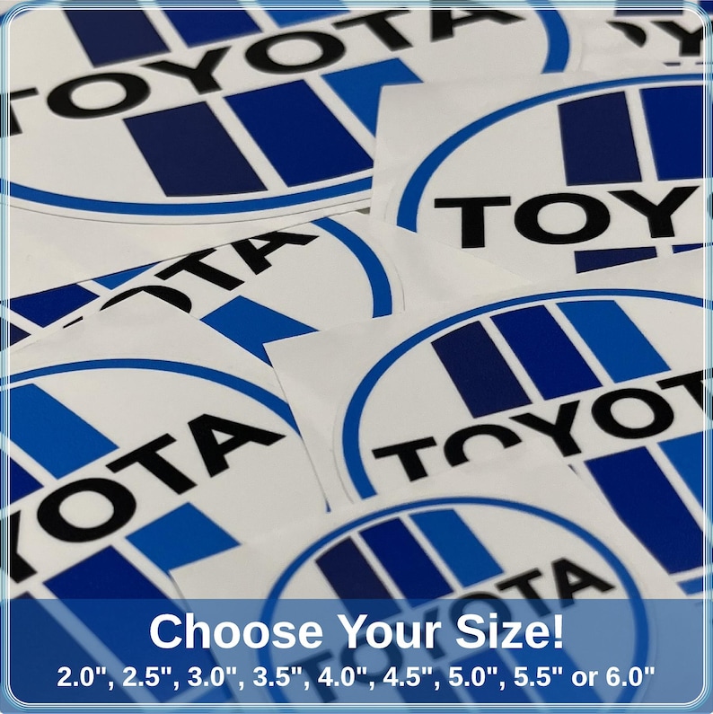 May include: A collection of white and blue Toyota logo stickers. The stickers display the Toyota logo in a blue and white design. The text at the bottom reads "Choose Your Size!" with size options from 5.08 cm to 15.24 cm.