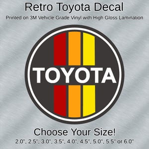 May include: Retro Toyota decal with the Toyota logo in white on a black circular background. The design incorporates vertical stripes in red, orange, and yellow. Printed on 3M vehicle grade vinyl with high gloss lamination. Available in various sizes.