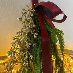 Norfolk Pine Swag. Set of 2. This real touch pine is a perfect accent to your Christmas decor with a trending Floppy Bow in Burgundy.