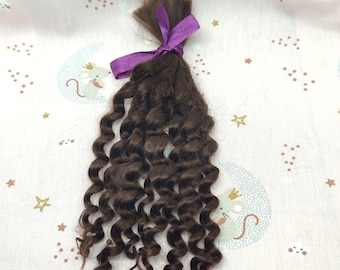 Mohair krullend bruin voor wedergeboorte