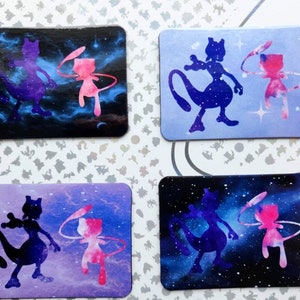 Mew and Mewtwo galaxy themed magnet