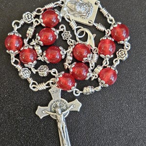 CR003- Handmade Car rosary.  Decade chaplet.  Ruby red glass beads.  Hangs on rear view mirror. Bracelet rosary.  Ecce Homo.   St. Benedict