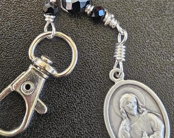 K09 - Handmade.  Sacred Heart of Jesus and St. Anthony pendant key chain.  Hand wrapped multi-facetted ebony black rondelle beads