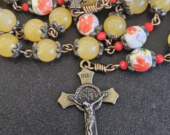 R105- Handmade rosary. Yellow glass beads.  Ceramic floral beads. Vintage rosary. St. Benedict crucifix.