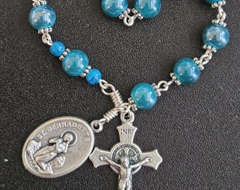 TR039- Handmade tenner decade pocket rosary. Shiny turquoise teal glass  beaded chaplet.  St. Bernadette. Ornate St. Benedict crucifix.