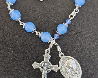 TR004- Handmade tenner decade pocket rosary.  Sky blue colored glass beaded chaplet . Holy family.  communion. St Benedict cross