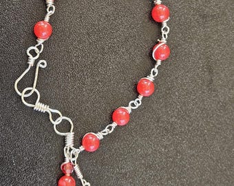 B05 - Rosary bracelet.  Decade rosary.  6mm round deep ruby red agate glass beads.  Hand wire wrapped in interlocking links. Simple look.
