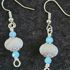 E15- Unique matte jasper stone bead dangling earrings. The stone is sand color with light blue undertones.8mmx10mm rondelle beads Hand made.
