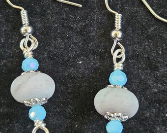 E15- Unique matte jasper stone bead dangling earrings. The stone is sand color with light blue undertones.8mmx10mm rondelle beads Hand made.