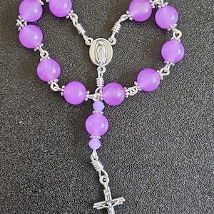 D110 - Handmade decade rosary.  A lilac purple pink colored decade chaplet.  8mm glass beads.  Cute. Our Lady of Guadalupe. Pocket rosary