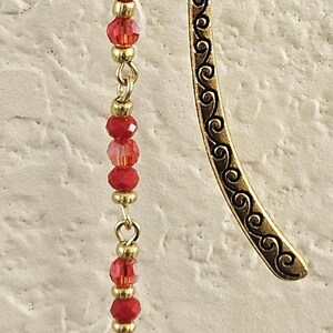 BK009- Christian Handmade bookmark.  Gold toned.  Ruby red crystal and selenite beads.  Shepherds hook.