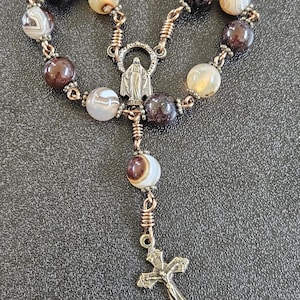 D118 - Handcrafted rosary.  1 decade chaplet  Beautiful.  8mm chocolate brown stripe agate round beads.  Pocket Rosary. Brass vintage rosary