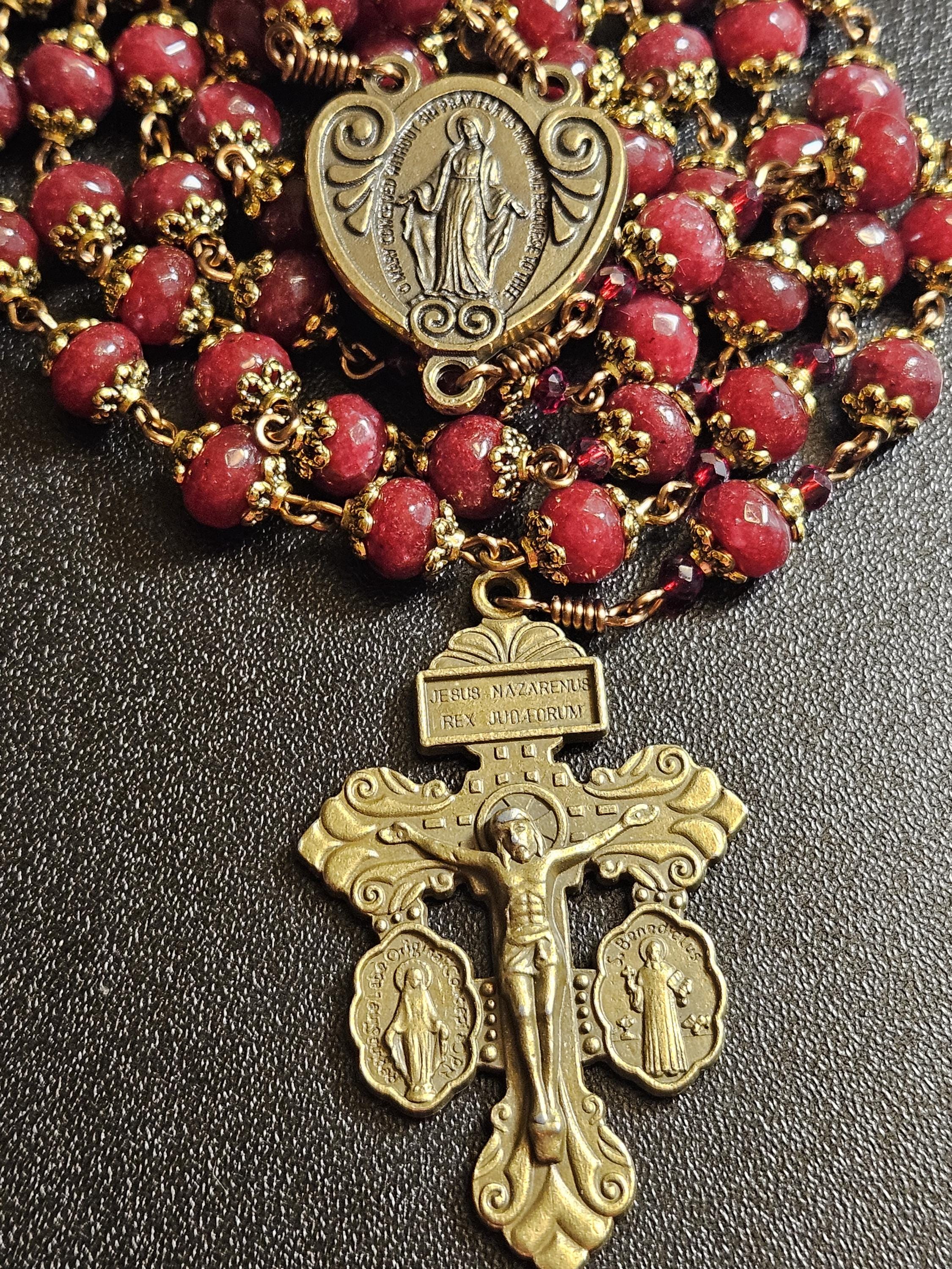 R100-  Handmade rosary.  5mmx8mm deep dark ruby red faceted garnet beads. Unique and beautiful chaplet. Bronze cross.  Vintage rosary.