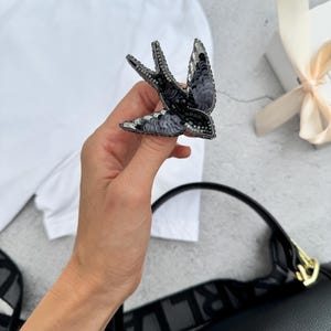 Swallow brooch, a symbol of femininity and love, a gift for her.