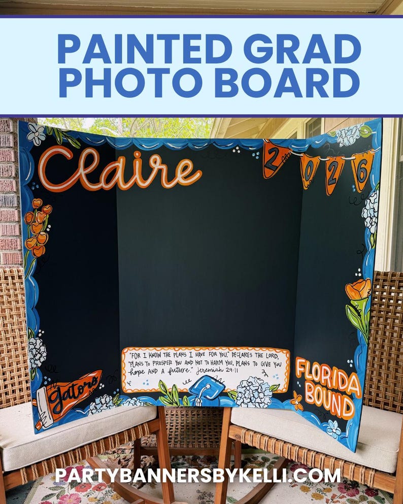 May include: A tri-fold black display board featuring hand-painted orange and blue floral accents, the name Claire, the year 2026, a Gators pennant, and the text Florida Bound. A central box contains the Bible verse Jeremiah 29:11 in black lettering.