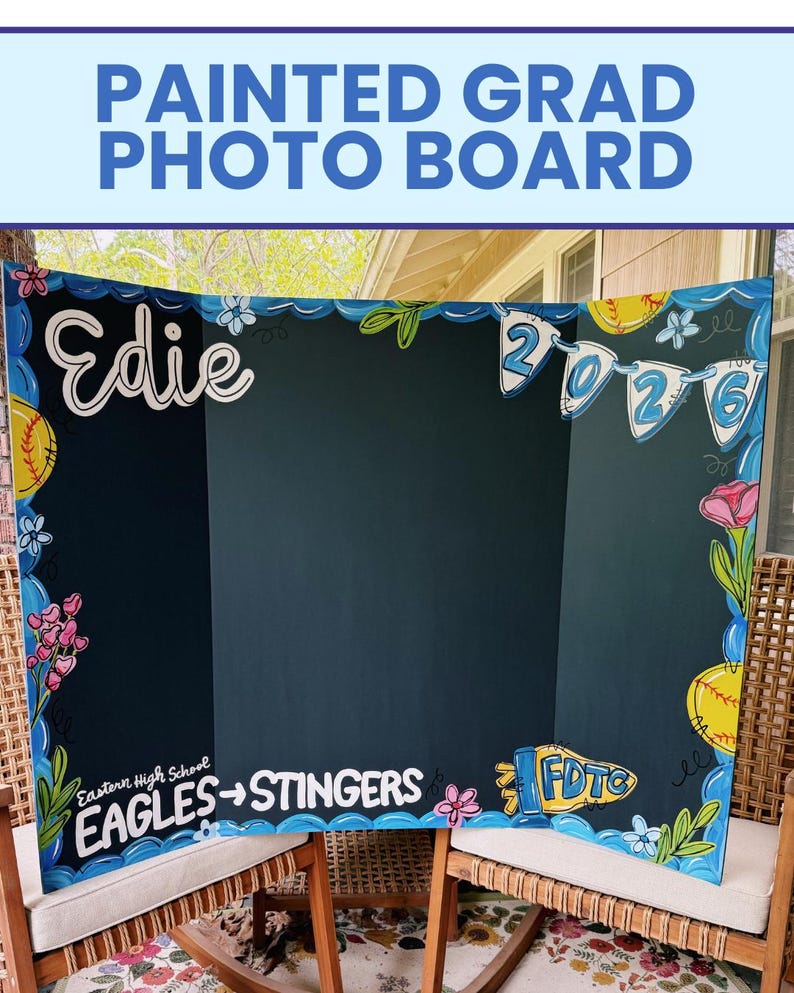 May include: A tri-fold display board with a dark background featuring hand-painted decorations including the name Edie, the year 2026 on pennants, yellow softballs, flowers, and the text Eastern High School EAGLES -> STINGERS and FDTC.