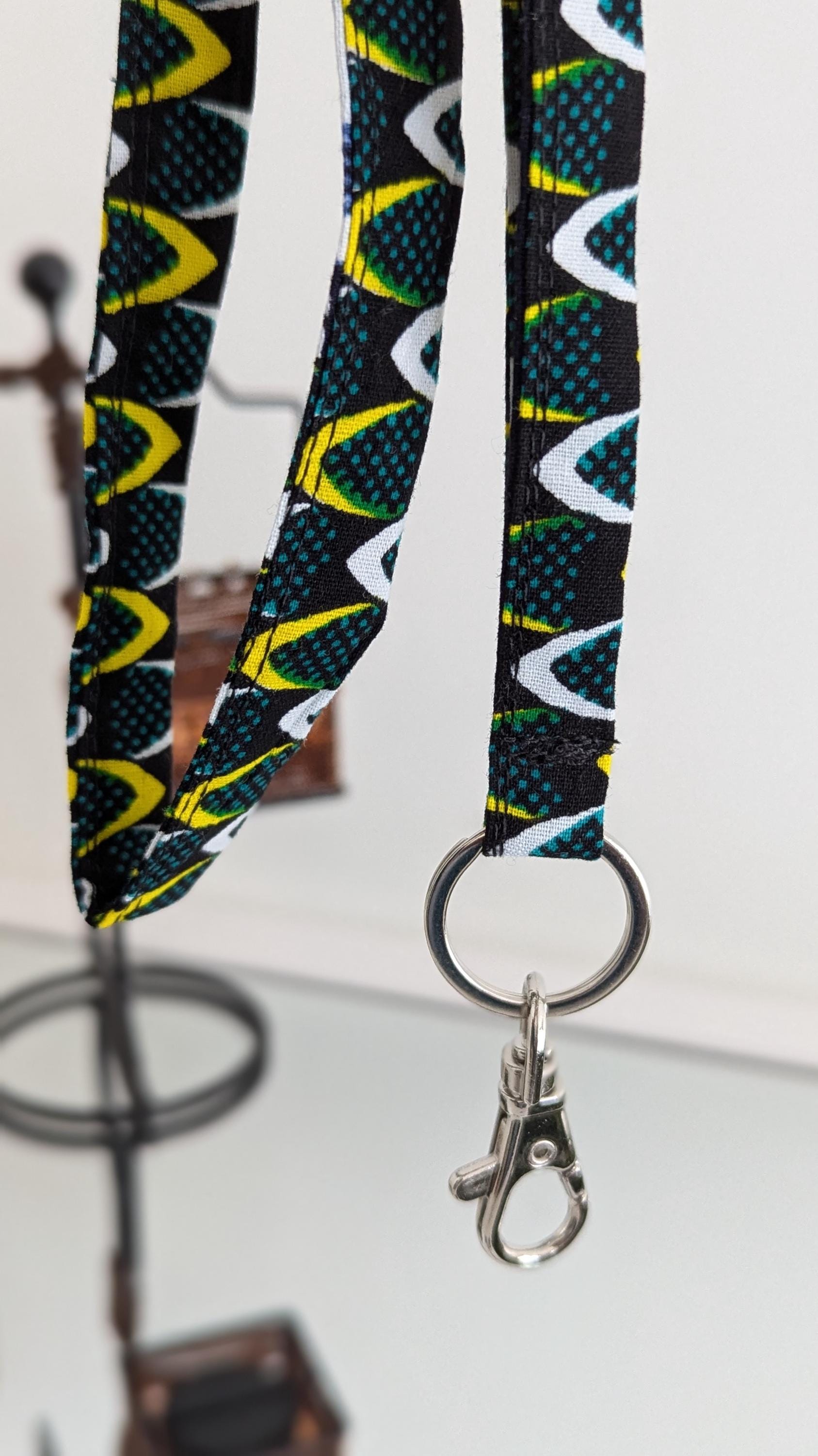 Badge holder or key ring for caregivers