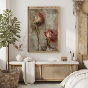 May include: A framed painting of two pink roses with green stems and thorns on a textured, light green background.