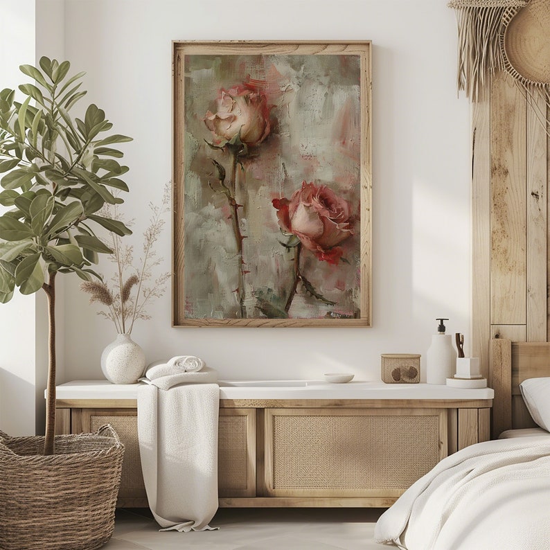 May include: A framed painting of two pink roses with green stems and thorns on a textured, light green background.