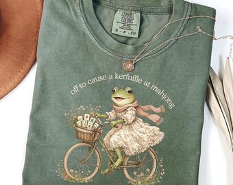 OFF TO CAUSE A Kerfuffle Shirt, Off To Cause A Kerfuffle At Mahong Shirt, Frog Lover Shirt Gift, Funny Saying Shirt, Frog Riding Bike Shirt