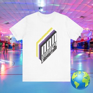 May include: White t-shirt with a purple, yellow, and black graphic that says "Non-Binary Liberation".