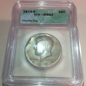 Amazing Double Clipped US Mint Error 1973 D Kennedy Half Dollar- Mint State 62- Very Tough Error Type