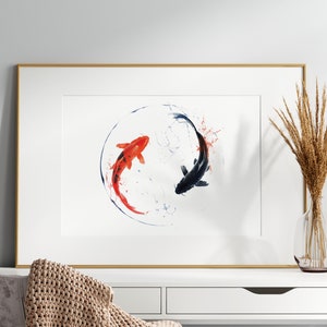 Puede incluir: Una pintura de acuarela enmarcada de dos peces koi nadando en círculo. Los peces son rojos y negros, y el fondo es blanco con salpicaduras de acuarela azul.