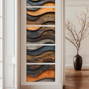 a modern art piece with a wooden texture, displayed on a wall in a room with a large window and a vase of branches.