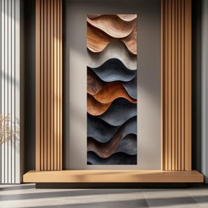 a modern interior design with a large abstract wall art piece that showcases a wave-like pattern in various shades of brown and black. The art piece is mounted on a wall between two wooden pillars, creating a visually striking focal point in the room.