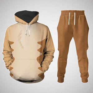 May include: A brown and tan hoodie and sweatpants set with a cartoon animal print. The hoodie has a black hood and a drawstring. The sweatpants have a drawstring waistband.