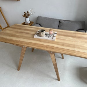 4-in-1 Oak Transformer Table: Adjustable Height Dining & Coffee Table