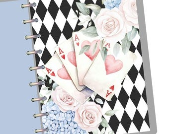May include: A black and white checkered background with a floral design and four playing cards. The cards are all aces and are arranged in a fan shape. The flowers are white roses and blue hydrangeas.