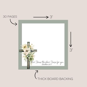 May include: A 30-page journal with a green cover and a floral cross design. The journal measures 3 inches by 3 inches and has a thick board backing. The text "For I know the plans I have for you. Jeremiah 29:11" is printed on the front cover.