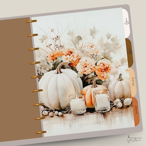 May include: A watercolor painting of a fall scene with pumpkins and candles. The pumpkins are white and orange, and the candles are in clear glass jars. The background is a soft, muted orange and brown.