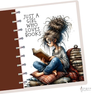 May include: A brown spiral bound notebook with a white cover featuring a cartoon illustration of a girl with messy brown hair reading a book. The text "JUST A GIRL WHO LOVES BOOKS" is printed on the cover.