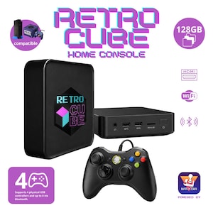 May include: A black Retro Cube home console with a matching black game controller. The console features a front panel with a headphone jack, two USB ports, a Micro SD slot, and a power button. The system includes 128GB of storage, HDMI, Wi-Fi, and Bluetooth connectivity, supporting up to 4 USB controllers.