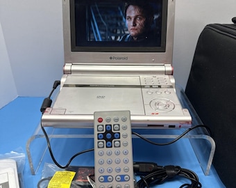 Polaroid BT-6023 Portable DVD player 7" Screen & Charger, Case + 4 Movies