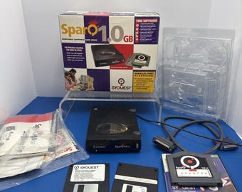 Unidad externa paralela SyQuest Sparq de 1 GB, en caja - Sin probar. Enciende.