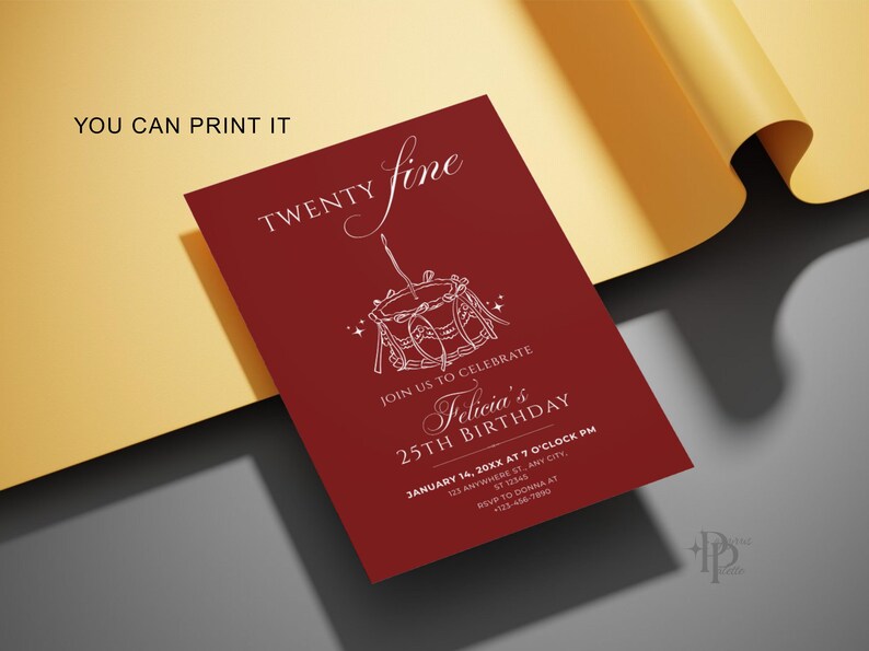 May include: A burgundy invitation card with white text and a drum illustration. The card reads "Twenty Fine" and "Felicia's 25th Birthday." The text "You Can Print It" is at the top left. The card is on a yellow and gray surface.