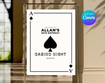 May include: A white sign with black text and a black spade design. The sign says "Welcome to Allan's 30th Birthday Casino Night 09.20.XX".