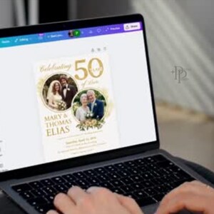 May include: A laptop displaying a golden anniversary invitation design. The invitation features two circular photo frames with couples, the text "Celebrating 50 Years of Love," and the names "Mary & Thomas Elias."