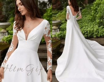 Atemberaubende maßgeschneiderte tiefe V-Ausschnitt Brautkleid elegante Applikationen und lange Ärmel rückenfreie Falten Brautkleid