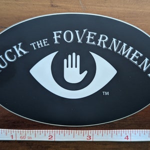 Guck the Fovern „Przestańcie nas obserwować!” symbol NAKLEJKA WINYLOWA