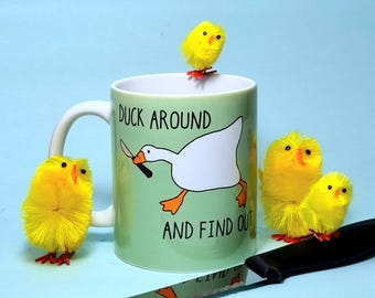 The 'Duck Around and Find Out' Duck with Knife Printed Mug