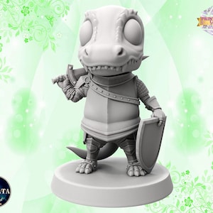 以下が含まれることがあります： 灰色で小さな鎧を着た恐竜のミニチュアフィギュア。剣と盾を持っています。恐竜はヘルメットをかぶっており、大きく歯の生えた口をしています。3Dプリンターで印刷されています。
